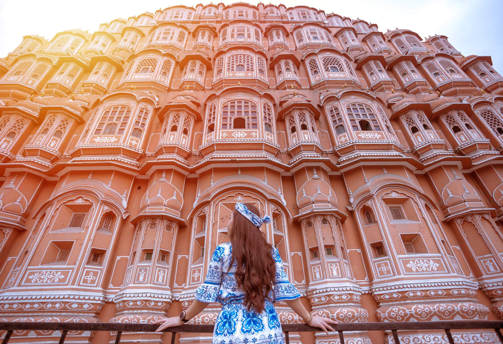 Young Woman during Sunset at Hawa Mahal, Jaipur,Rajasthan, India; Shutterstock ID 1480940000; purchase_order: ; job: KAYAK; client: ; other: