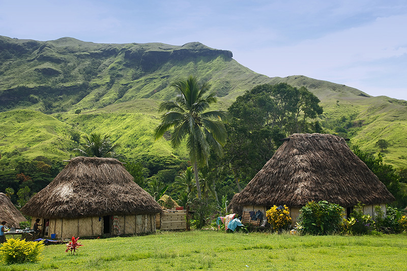 View of traditional bure houses at eco-tourist destination Navala village, Viti Levu island, Fiji