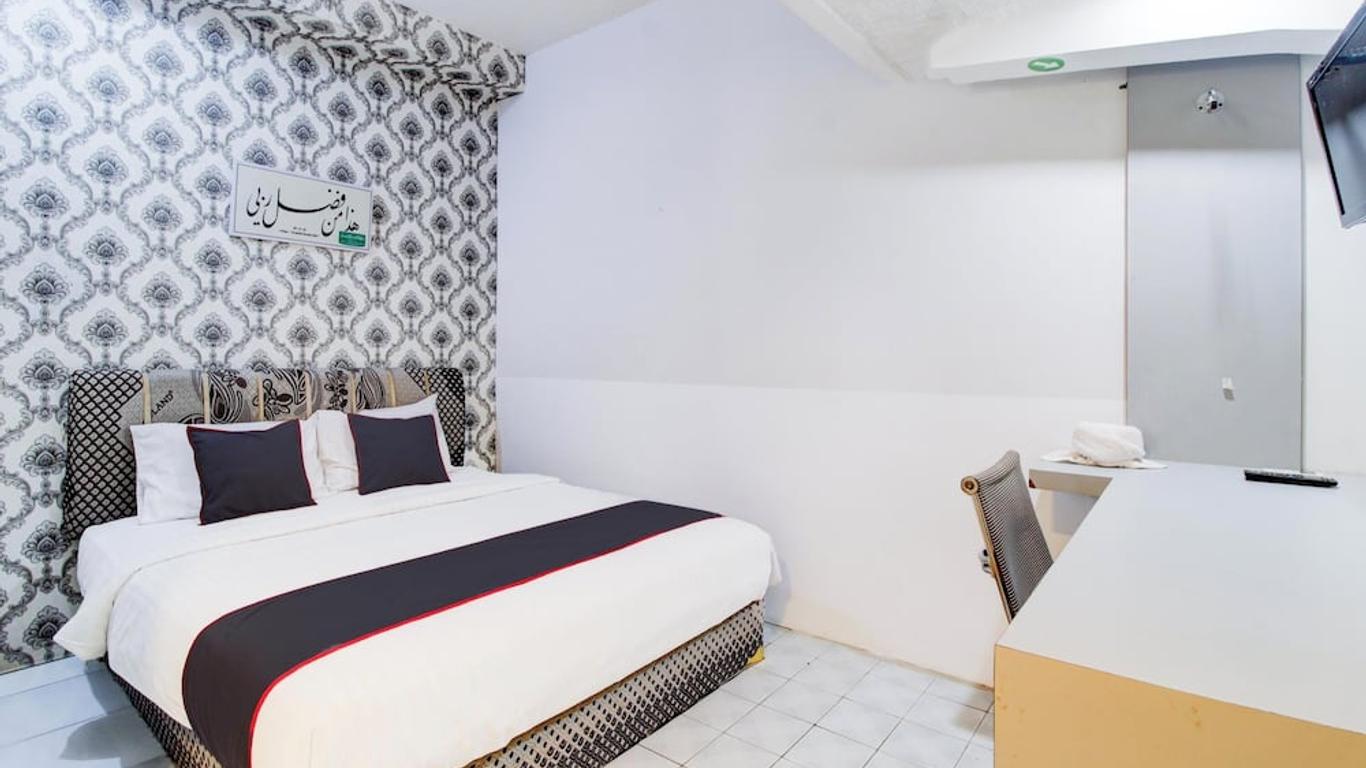 Oyo 433 Nelvi Guest House Syariah